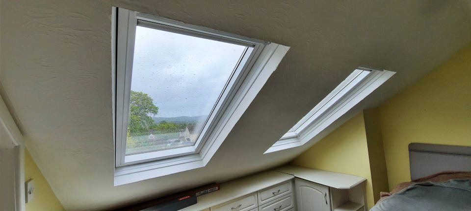 An image of Installation of a dozen VELUX roof windows goes here.