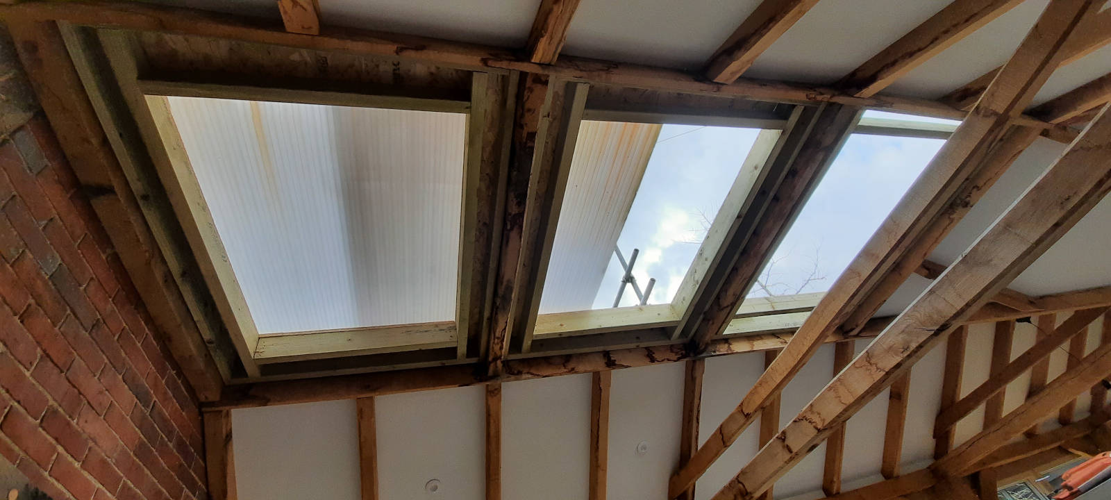 Image of mature extension flat roof windows sussex 003 <h2>2021-07-05 - Mature Sussex House Extension Rejuvenated with Velux Rooflights</h2>