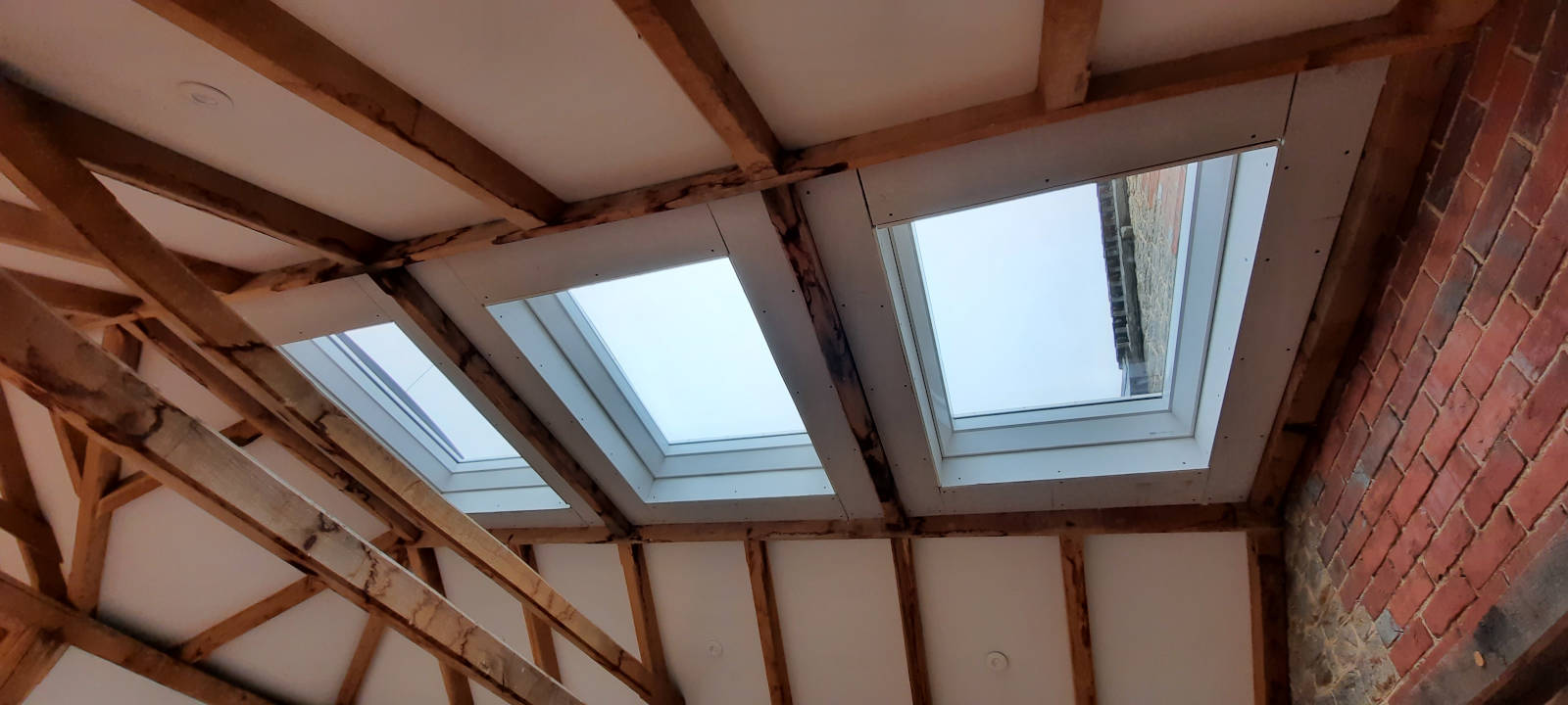 Image of mature extension flat roof windows sussex 007 <h2>2021-07-05 - Mature Sussex House Extension Rejuvenated with Velux Rooflights</h2>
